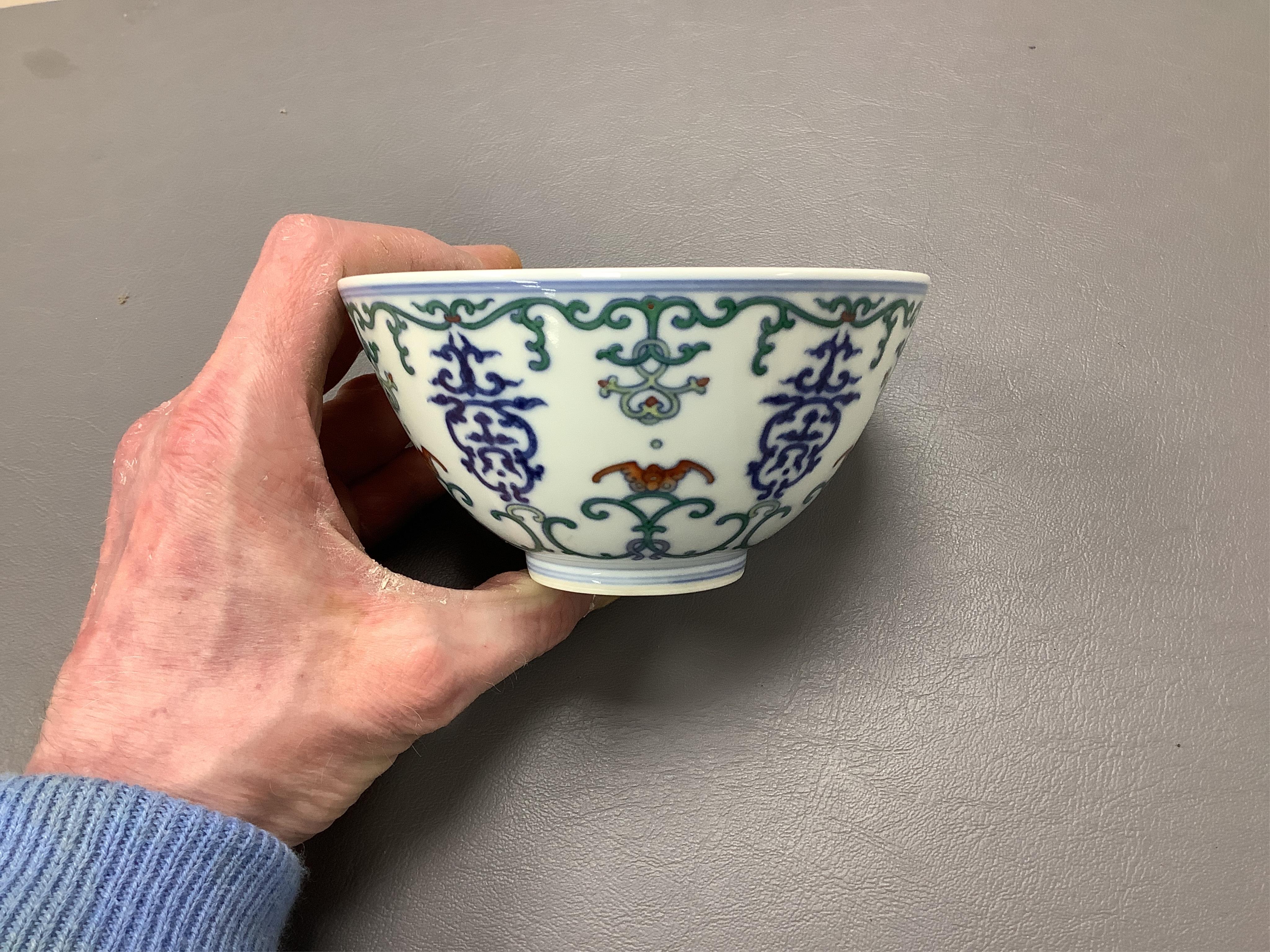 A Chinese porcelain doucai bowl, 13cm in diameter